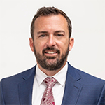 Headshot of expert Brandon Boudreau for The Mortgage Reports' 2023 Mortgage Rate Predictions